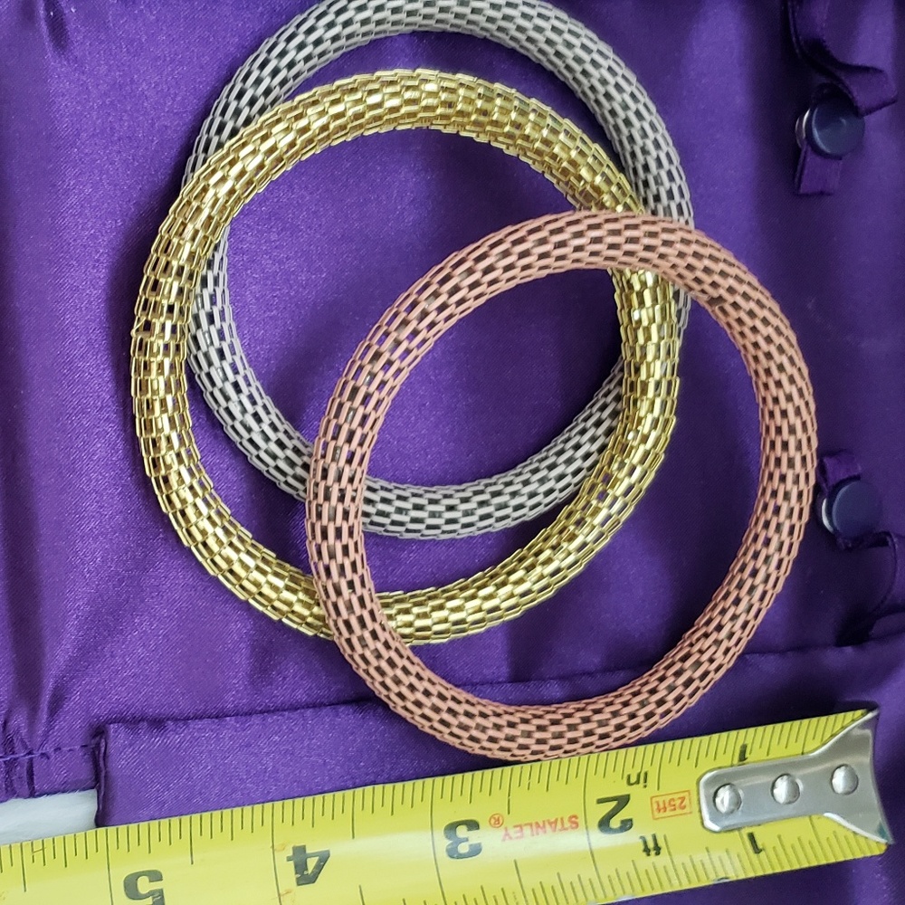 3 bangle type Bracelets